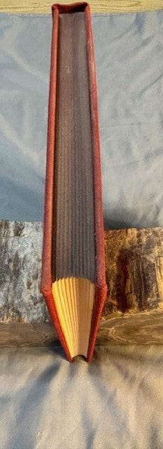 Dahl, Roald.  Charlie and the Chocolate Factory. NY: Alfred Knopf, (1964). 1st ed, 1st printing with red cloth, top edge brown and 6-line collophon on last page. 1st issue DJ with no ISBN number on rear panel Book is Near mint, DJ only Fair