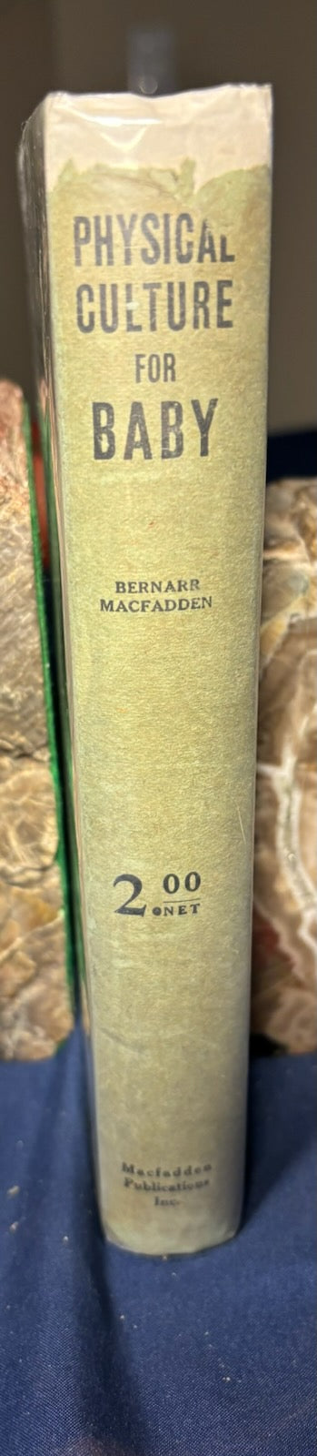 Macfadden, Bernarr.  Physical Culture for Baby. NY: Macfadden, 1924. 1st ed. Illus. Top 1/2" DJ spine chipped.VG/VG