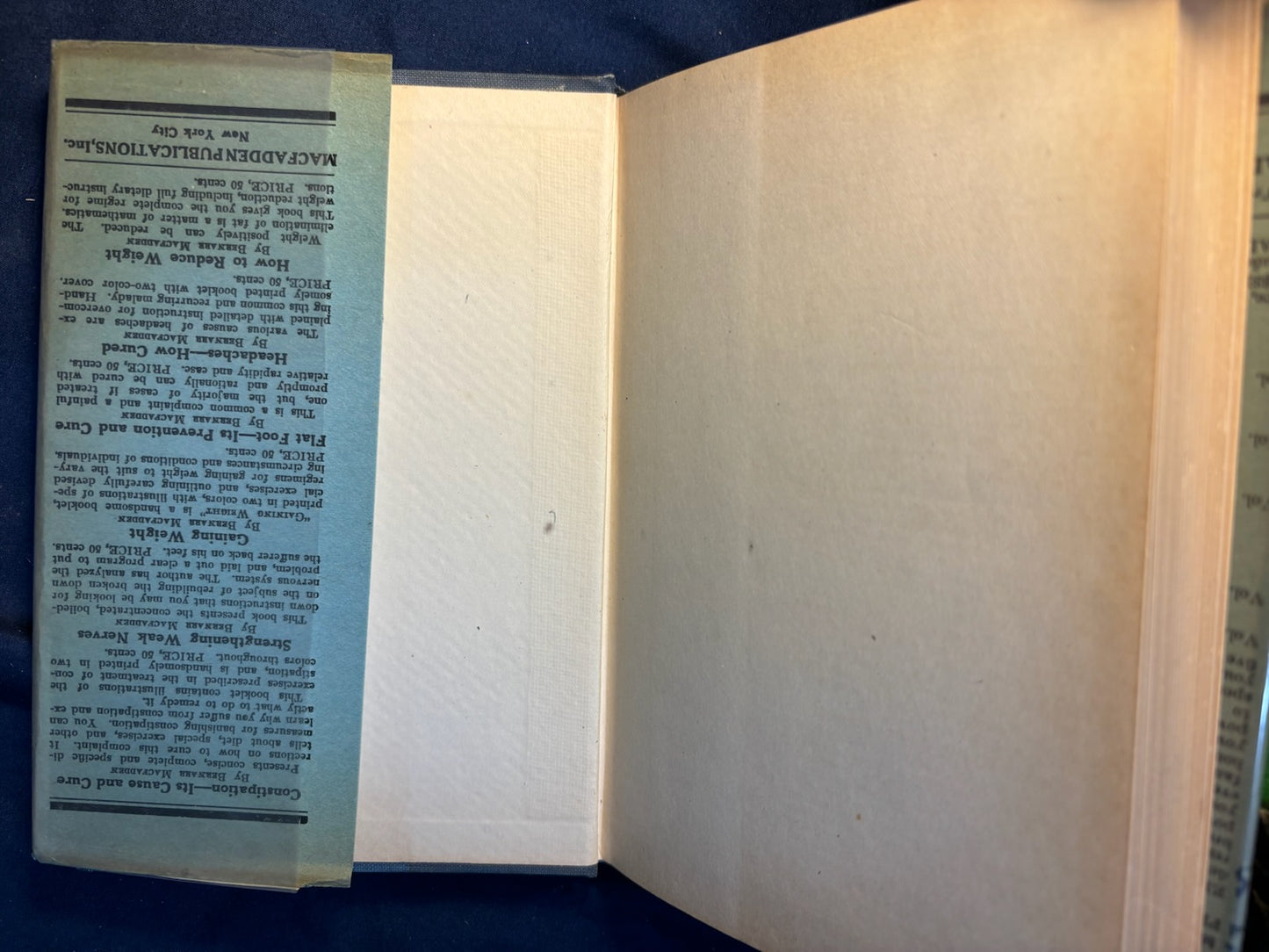 Macfadden, Bernarr.  Physical Culture for Baby. NY: Macfadden, 1924. 1st ed. Illus. Top 1/2" DJ spine chipped.VG/VG