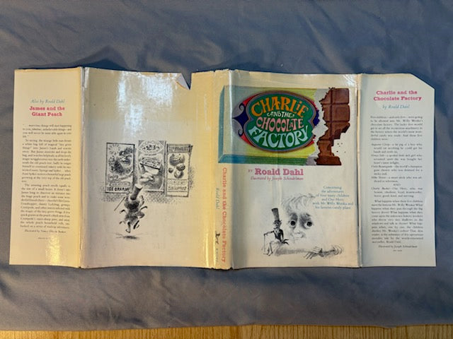 Dahl, Roald.  Charlie and the Chocolate Factory. NY: Alfred Knopf, (1964). 1st ed, 1st printing with red cloth, top edge brown and 6-line collophon on last page. 1st issue DJ with no ISBN number on rear panel Book is Near mint, DJ only Fair