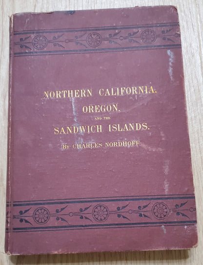 Nordhoff, Charles. Northern California, Oregon and the Sandwich Islands. 1874. 1st ed. Illus. Cloth, gilt. Cloth frayed, rubbed, bb-sized hole through first four pages, bookplate removed. VG