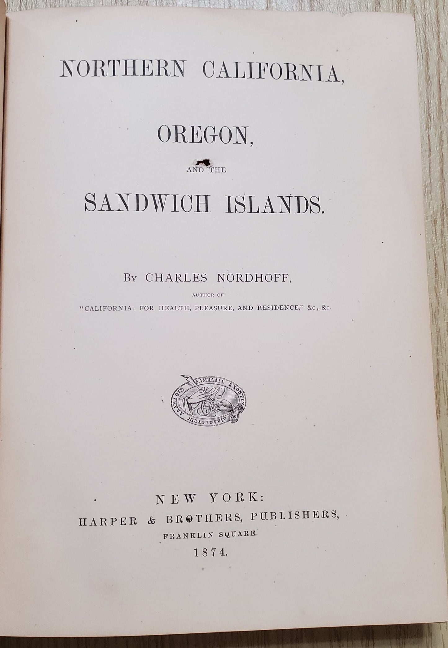 Nordhoff, Charles. Northern California, Oregon and the Sandwich Islands. 1874. 1st ed. Illus. Cloth, gilt. Cloth frayed, rubbed, bb-sized hole through first four pages, bookplate removed. VG