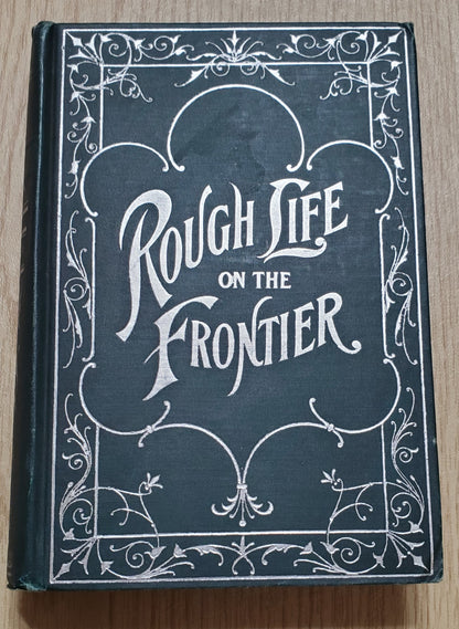 Van Gordon, Scott. Rough Life on the Frontier. Chicago: Rhodes & McClure, (1903); Illus. Pict cloth, silver. Page darkening. VG