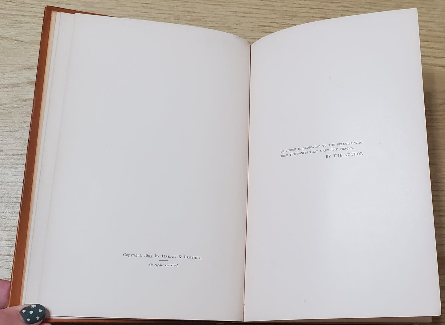 Remington, Frederick. Pony Tracks. NY: Harper &amp; Bros, 1895. 1st ed. Pict cloth, gilt. Hinges broken, spine lean, fraying, some rubbing. VG