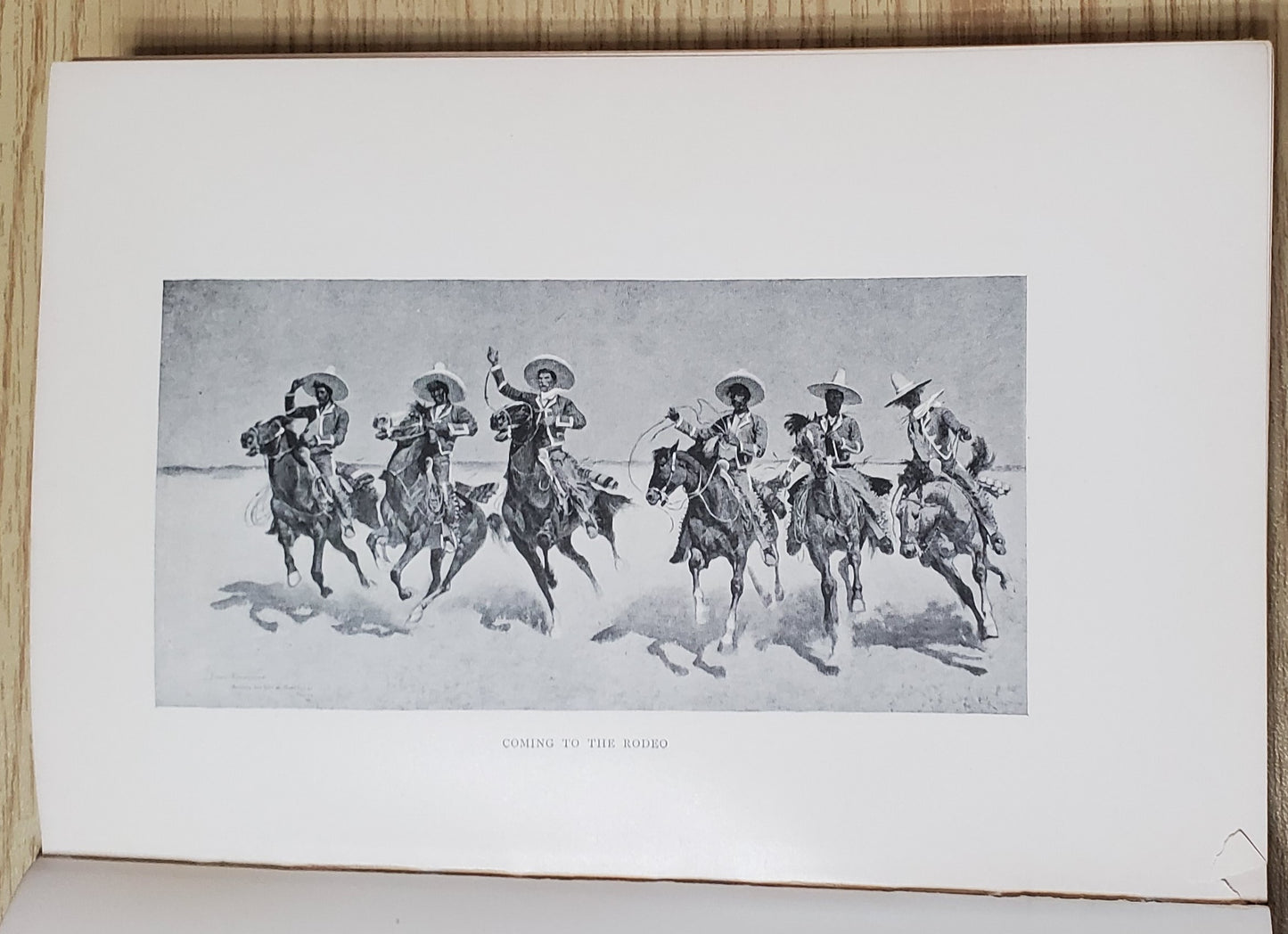 Remington, Frederick. Pony Tracks. NY: Harper &amp; Bros, 1895. 1st ed. Pict cloth, gilt. Hinges broken, spine lean, fraying, some rubbing. VG