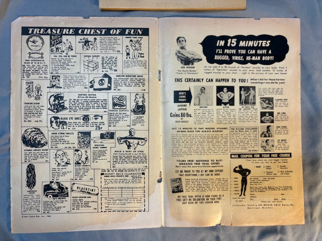 Justice League of America #1    cover detached from staples, light waterstain inside front cover   Good