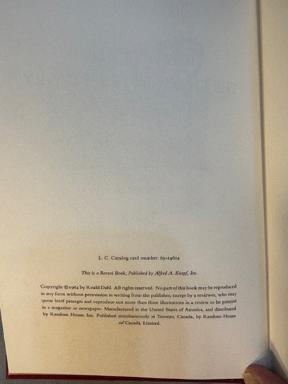 Dahl, Roald.  Charlie and the Chocolate Factory. NY: Alfred Knopf, (1964). 1st ed, 1st printing with red cloth, top edge brown and 6-line collophon on last page. 1st issue DJ with no ISBN number on rear panel Book is Near mint, DJ only Fair