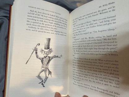 Dahl, Roald.  Charlie and the Chocolate Factory. NY: Alfred Knopf, (1964). 1st ed, 1st printing with red cloth, top edge brown and 6-line collophon on last page. 1st issue DJ with no ISBN number on rear panel Book is Near mint, DJ only Fair