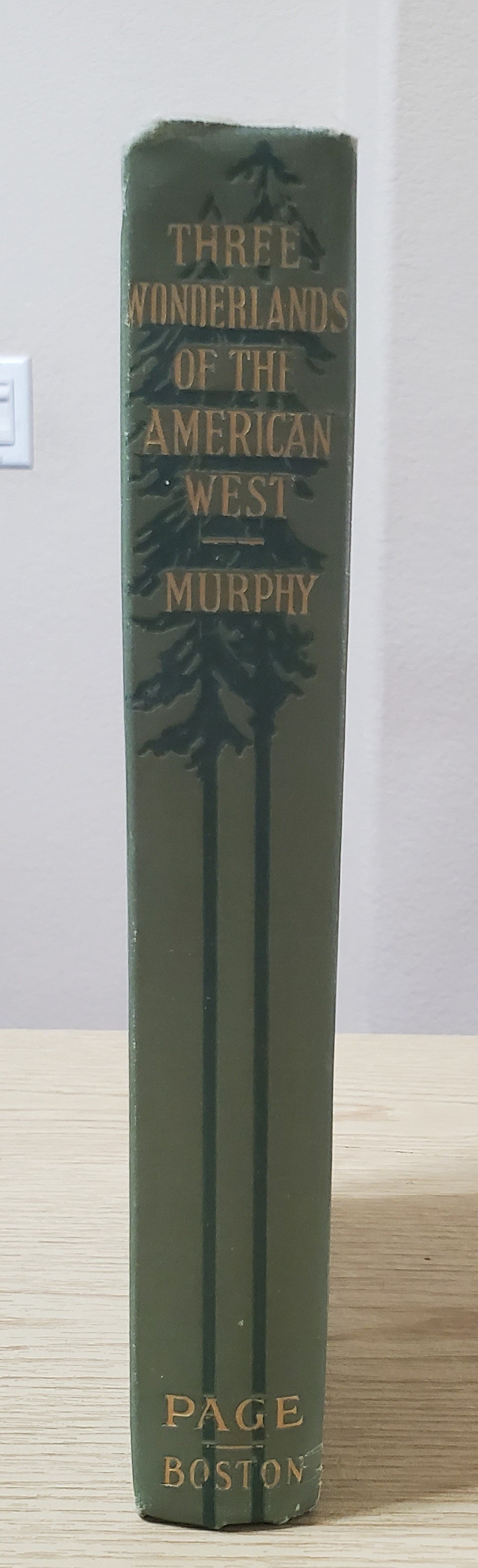 Murphy, Thomas Three Wonderlands of the American West. Boston: Page, 1912. 1st ed.&nbsp; Color plates by Thomas Moran. Discoloration along board edges, small clipping pasted on endpaper. Pict cloth, gilt. VG